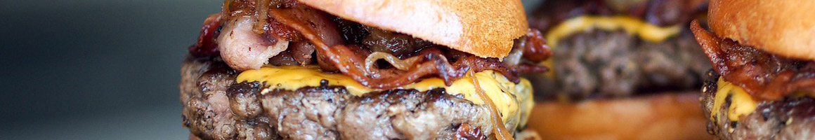 Eating American (Traditional) Burger at Beaverton Charburger restaurant in Beaverton, OR.